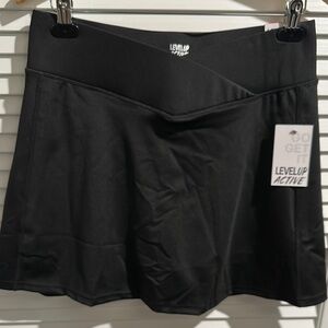 NWT Level Up Active Tennis/Gym Skort with under pants with two side pockets.